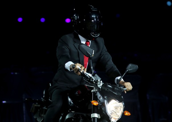 Joko Widodo, the President of Indonesia rides a motorbike