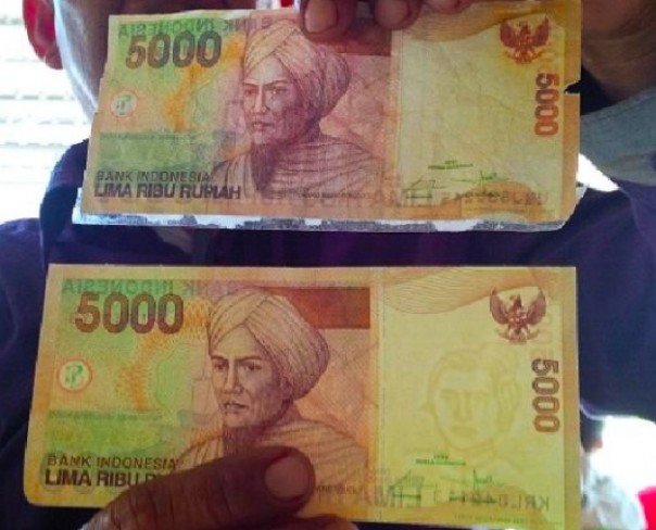 Uang palsu pecahan Rp 5.000 diperlihatkan. /Ist