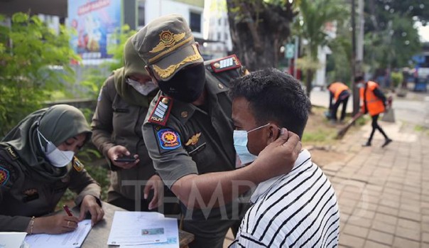 Ahli Epidemiologi Sebut Jokowi Tergesa-gesa Melonggarkan Amanat Masker